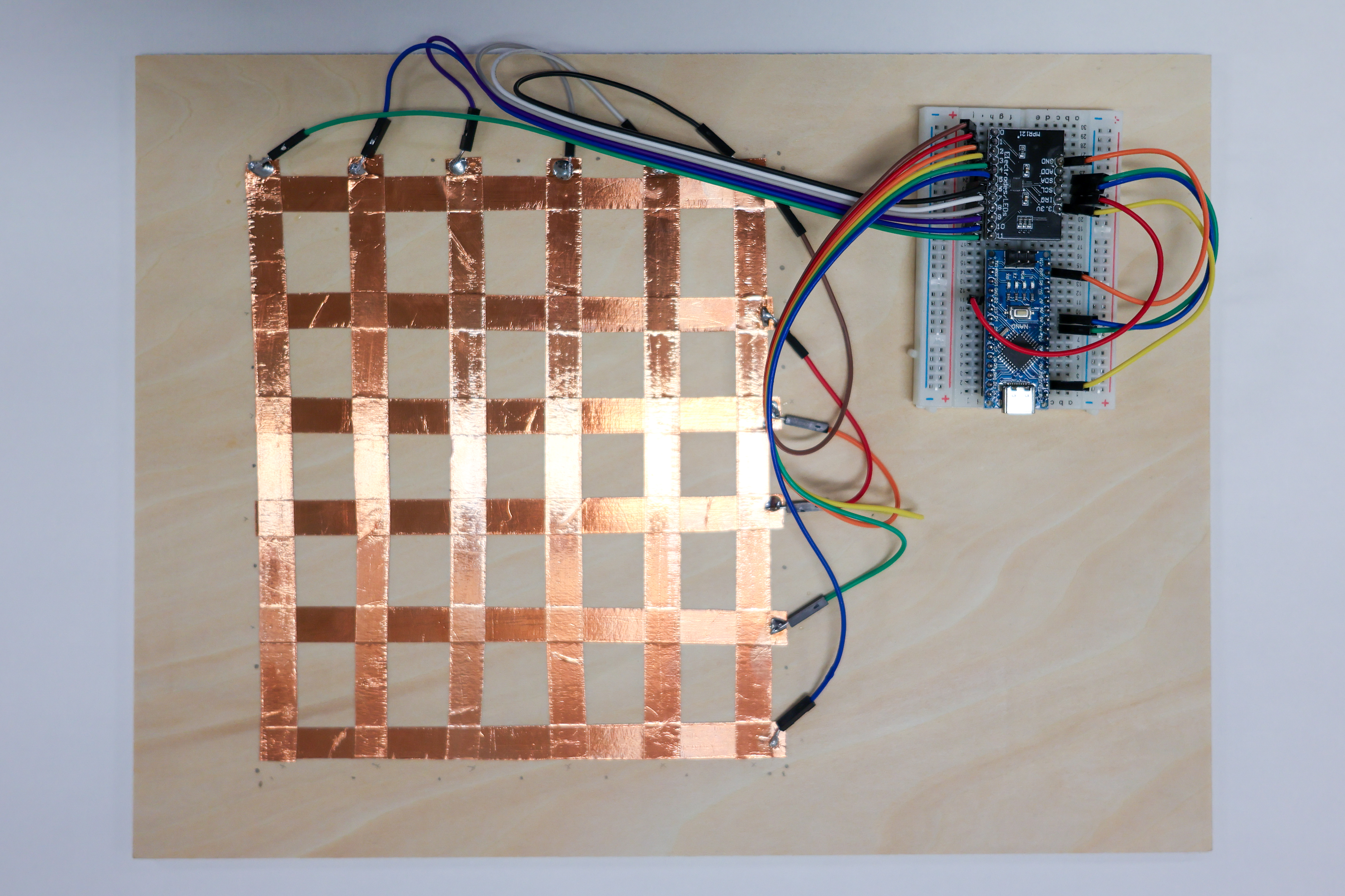 Copper tape grid and wiring for capacitive touch experiment