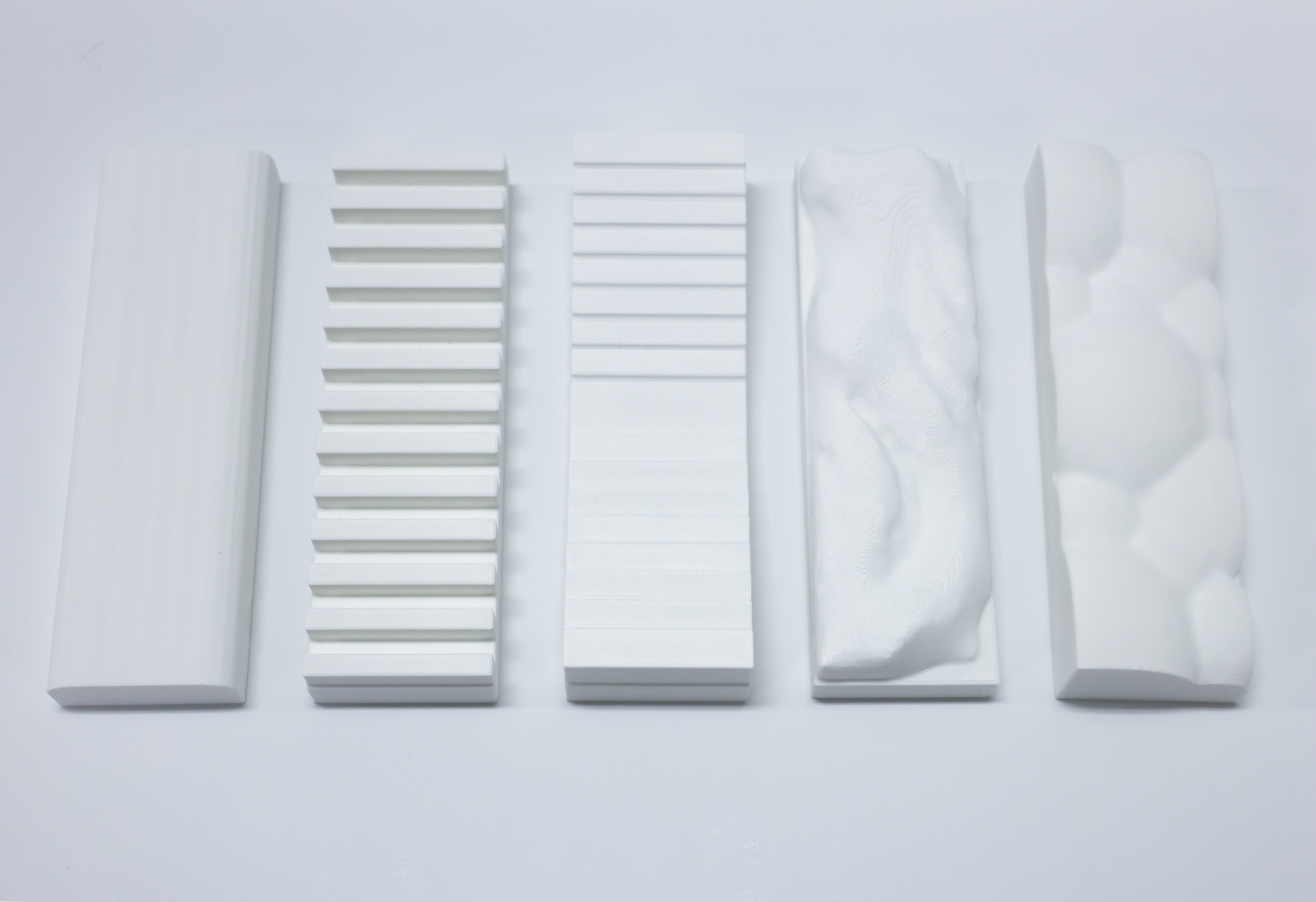 Prototype attached to wooden instrument showing material contrast